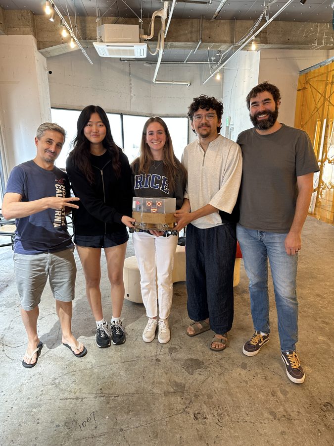 Group photo holding Cling-E